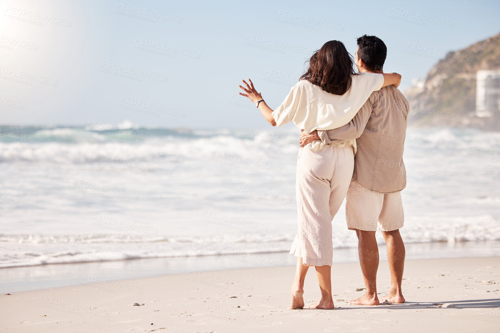 Buy stock photo Couple hug on beach, sea and back view with trust, travel and vacation in Mexico with love and bonding outdoor. Mockup space, summer and people together in nature with relationship and commitment