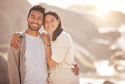 Buy stock photo Portrait, couple and holiday with hug at ocean with happiness in the summer on the weekend. Face, smile and man with woman at the beach for travel with the sunshine for bond together on a trip.