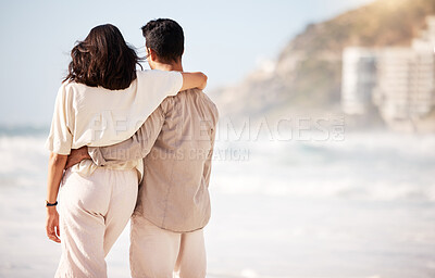 Buy stock photo Couple hug on beach, ocean and back view with trust, travel and vacation in Mexico with love and bonding outdoor. Mockup space, summer and people together in nature with relationship and commitment