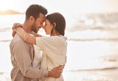 Buy stock photo Couple hug at beach, forehead touch and travel with sun and sea, love and care with vacation in Mexico. Commitment, support and trust in relationship, tourism and people embrace with mockup space