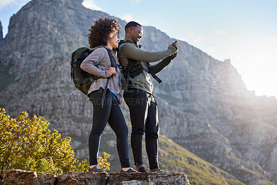 Buy stock photo Camera, fitness and couple hiking, view and exercise for wellness, health and cardio with happiness. Training, black man and woman with workout, picture and memory with a smile, hike and adventure