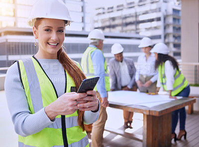 Buy stock photo Happy woman, portrait and construction worker with smartphone, team and plans in city. Female engineer, smile and builders in meeting for planning, building and development in urban town for property