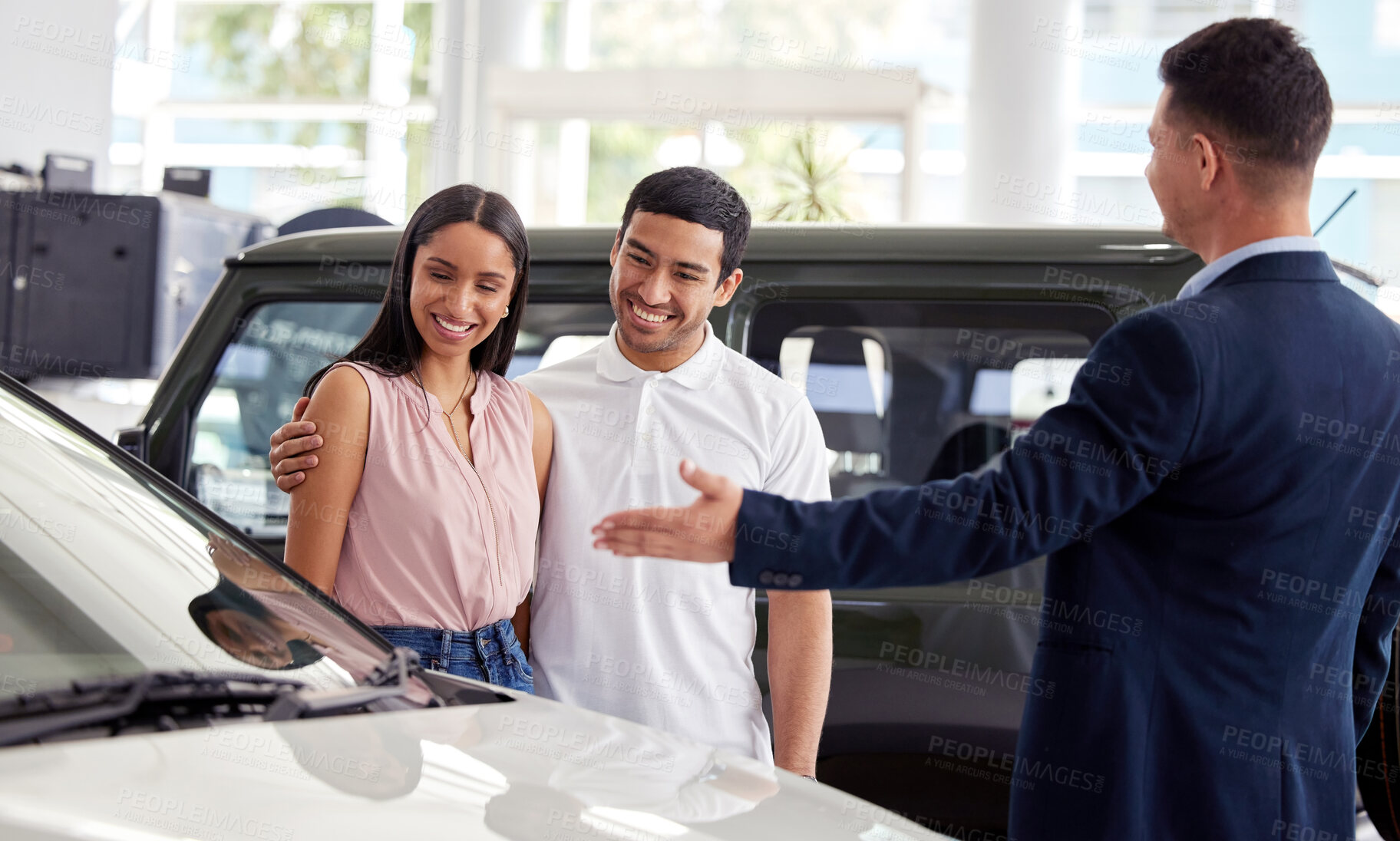 Buy stock photo Couple at car dealership, choice and transportation with salesman, customer buying new transport with luxury. Sales, agreement and show cars with people at automobile showroom with purchase decision