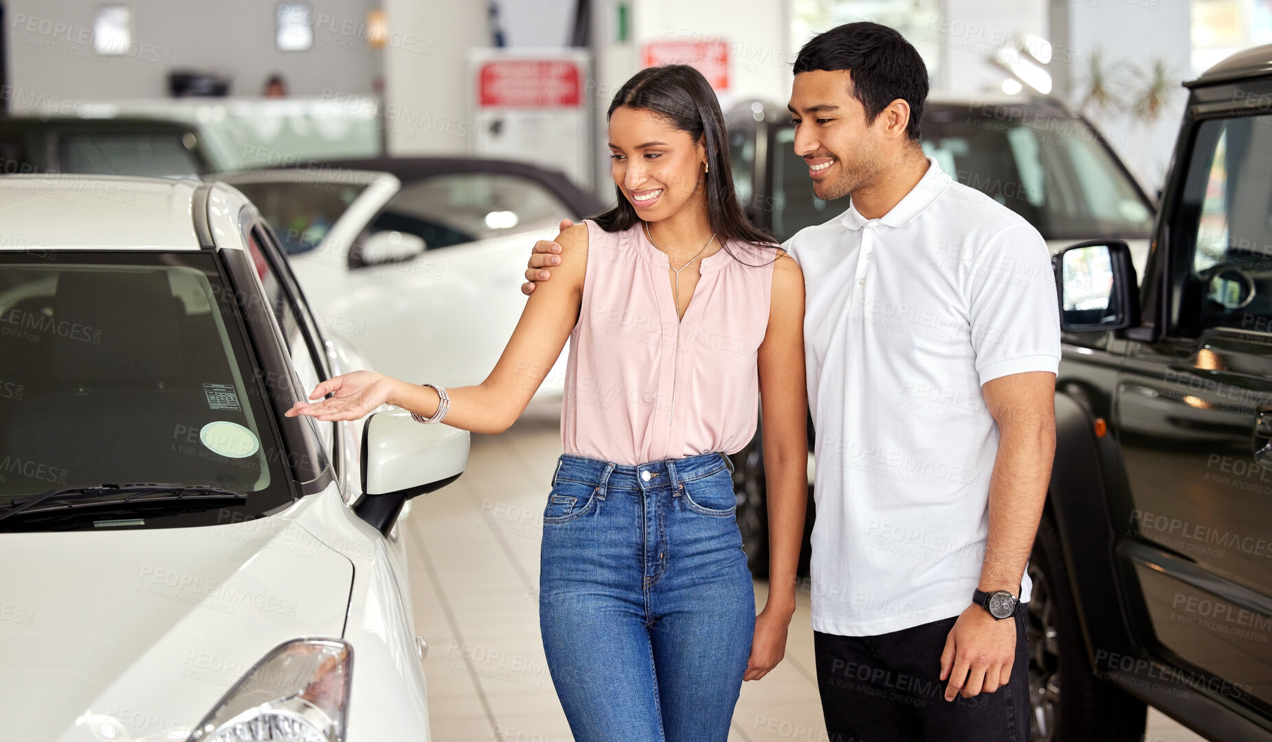 Buy stock photo Couple at car dealership, choice and transport with smile, people buying new vehicle with luxury and customer. Happy with decision, man and woman at automobile showroom, purchase and transportation