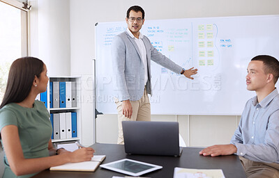 Buy stock photo Man, discussion and office on whiteboard for teamwork, collaboration and employee training as mentor. Support, help and learning in boardroom with meeting for career or skill growth and development