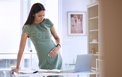 Buy stock photo Business, woman and pregnant pain by desk for contractions, muscle ache and tension in lower stomach for hard kick. Mother to be, stress and hand on abdomen for pressure, discomfort and fatigue.