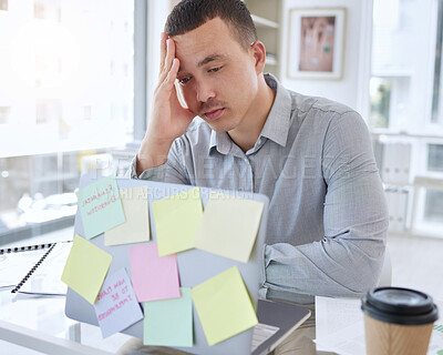 Buy stock photo Man, headache and stress with laptop in office with glitch, thinking and tired with notes at startup. Person, writer and employee with anxiety, burnout and fatigue with brain fog at creative agency