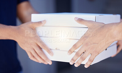 Buy stock photo Closeup, hands and pizza for delivery with boxes, courier working with food for customer. Zoom, package and service for lunch with shipping and container, takeaway or fast food at front door