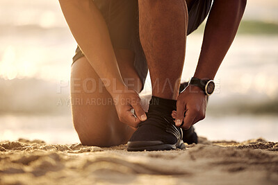 Buy stock photo Tie, beach or hands of person with shoe lace for fitness training, exercise or running workout on sand. Runner, closeup or legs of sports athlete with footwear ready to start exercising in nature 