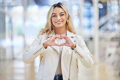 Buy stock photo Smile, heart and portrait of woman with hands for love, care or feedback review at shopping mall. Fingers, support and gesture for peace, gratitude and trust with promotion of charity donation emoji