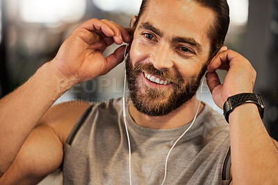 Buy stock photo Gym, fitness or happy man with earphones for music, streaming or listening to podcast for workout inspiration. Health, wellness or athlete with audio, sound and radio for sports, exercise or training