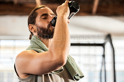 Buy stock photo Tired, break and a man drinking water in the gym after training, hydrating and thirsty after a workout. Fitness, health and a hydrated person with a bottle to drink after sports, cardio or exercise