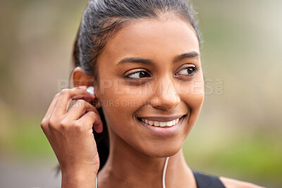 Buy stock photo Smile, thinking and a woman with music while training, running or doing cardio in nature. Happy, ideas and face of an athlete with idea for a podcast, audio or radio during an outdoor workout