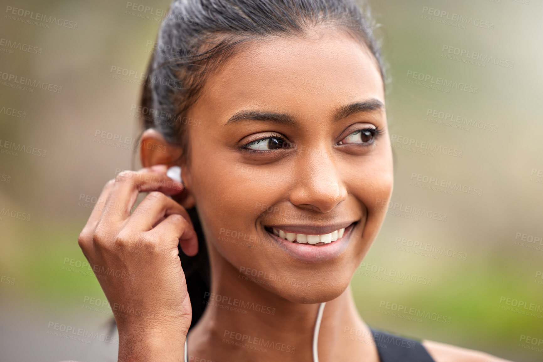 Buy stock photo Smile, thinking and a woman with music while training, running or doing cardio in nature. Happy, ideas and face of an athlete with idea for a podcast, audio or radio during an outdoor workout