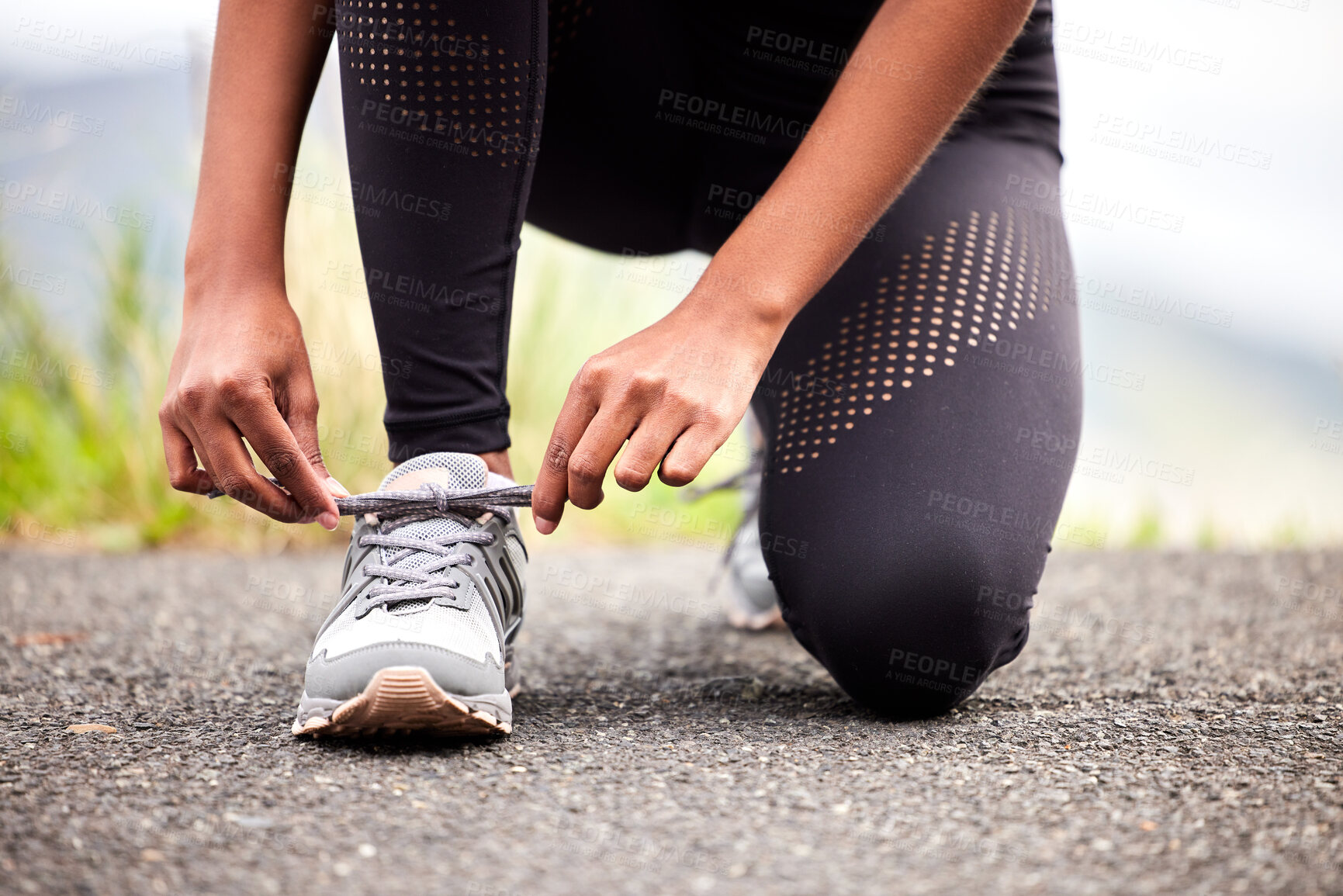 Buy stock photo Sport, feet of woman tying sneakers and runner on road for safety during outdoor marathon training. Running, cardio health and wellness, female athlete fixing laces on footwear and closeup of asphalt