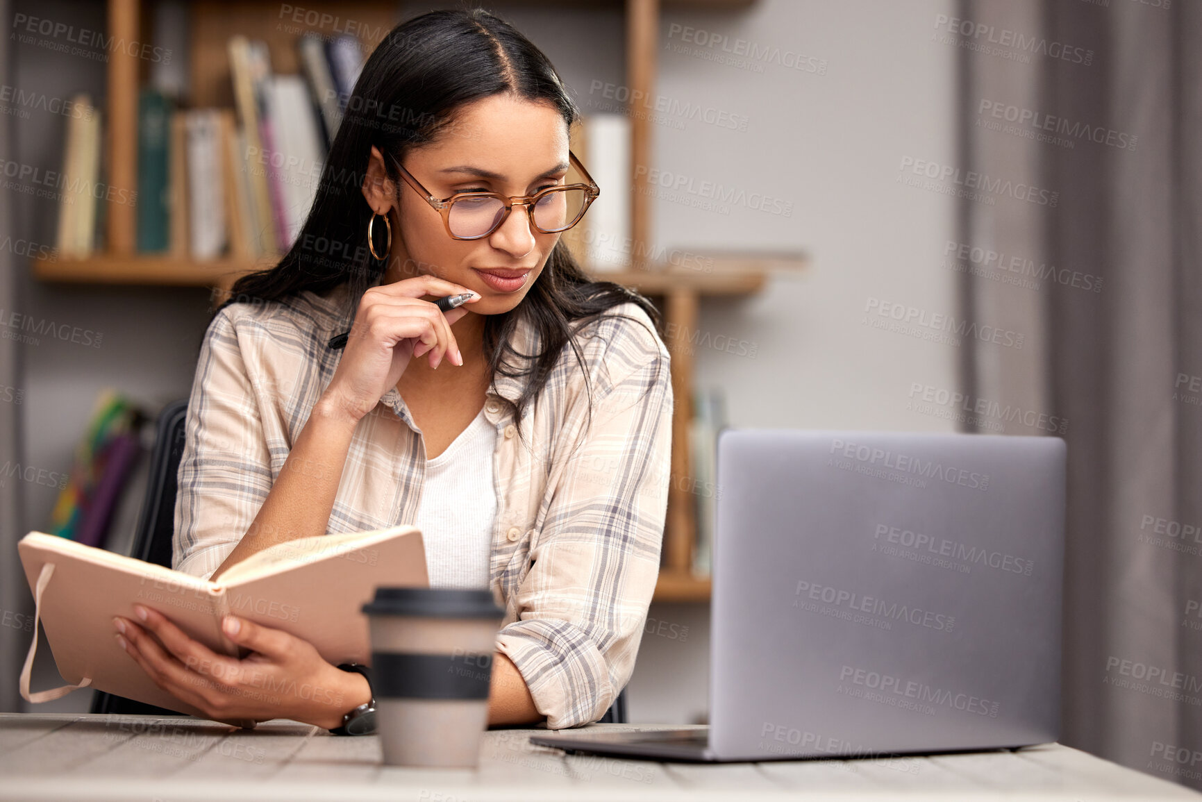 Buy stock photo Laptop, notebook and education with a student woman in a university library to study for a final exam. Technology, learning and diary with a young female college pupil reading research material