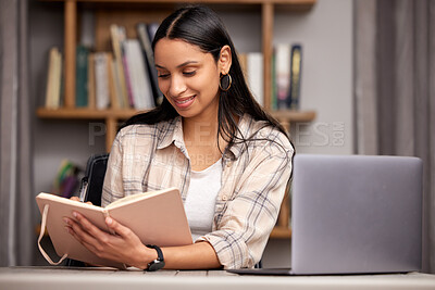 Buy stock photo Laptop, book and education with a student woman in a university library to study for a final exam or test. Technology, learning and journal with a young female college pupil reading research material