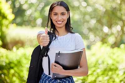 Buy stock photo Student, thumbs up and portrait of woman on university campus for education, learning or knowledge. Hand gesture, bokeh and female person with books for happiness, approval or OK sign at school