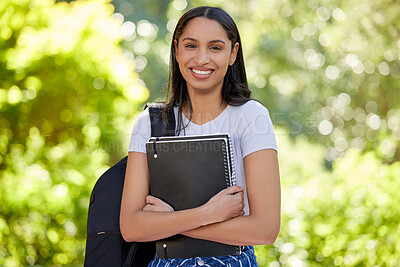 Buy stock photo Happy, woman and student at campus with book in portrait for learning or education with knowledge for growth. Female person, school and study at university with information or notes for future