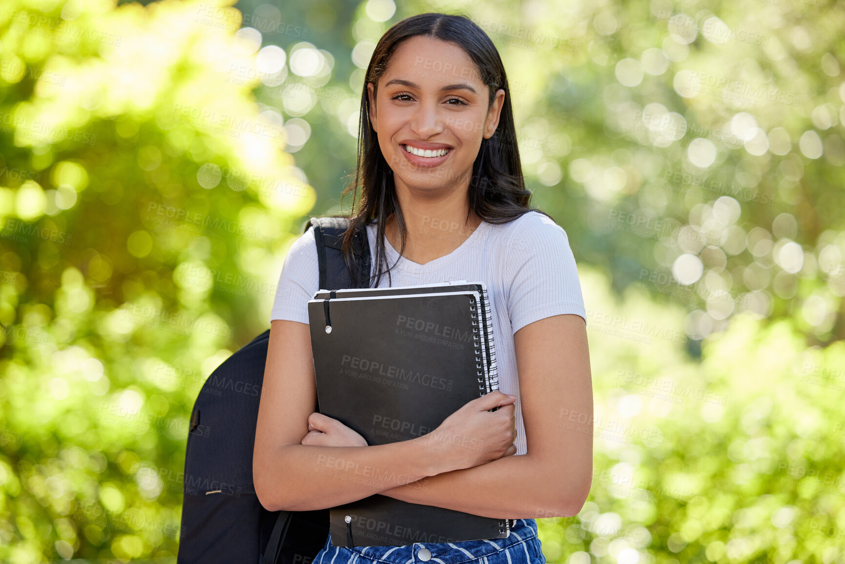 Buy stock photo Happy, woman and student at campus with book in portrait for learning or education with knowledge for growth. Female person, school and study at university with information or notes for future