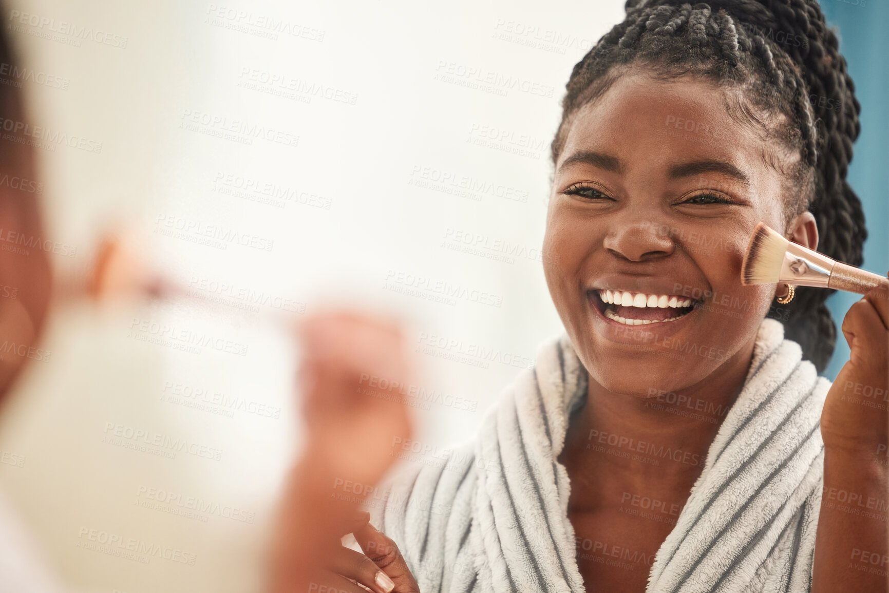 Buy stock photo Cropped shot of a beautiful young woman applying make-up