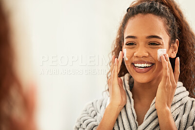 Buy stock photo Cropped shot of a beautiful young woman applying mascara