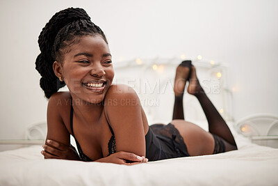 Buy stock photo Happy, sexy and a black woman in lingerie on a bed, thinking and ready for the night. Smile, ideas and an African girl in the bedroom in seductive underwear for confidence, happiness or sensuality