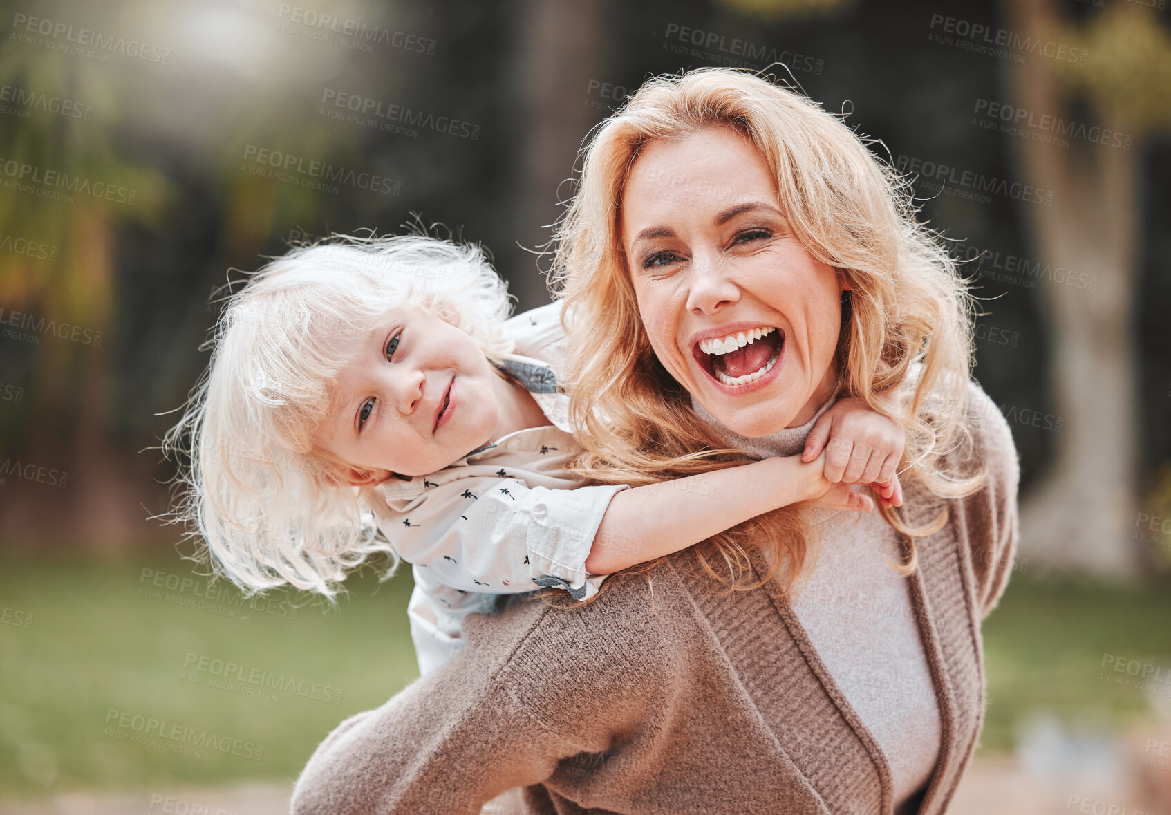 Buy stock photo Portrait, mom and kid with piggy back, smile, and playful embrace for outdoor bonding together. Love, mother and son in backyard with hug, care and support with weekend fun in nature for happy family