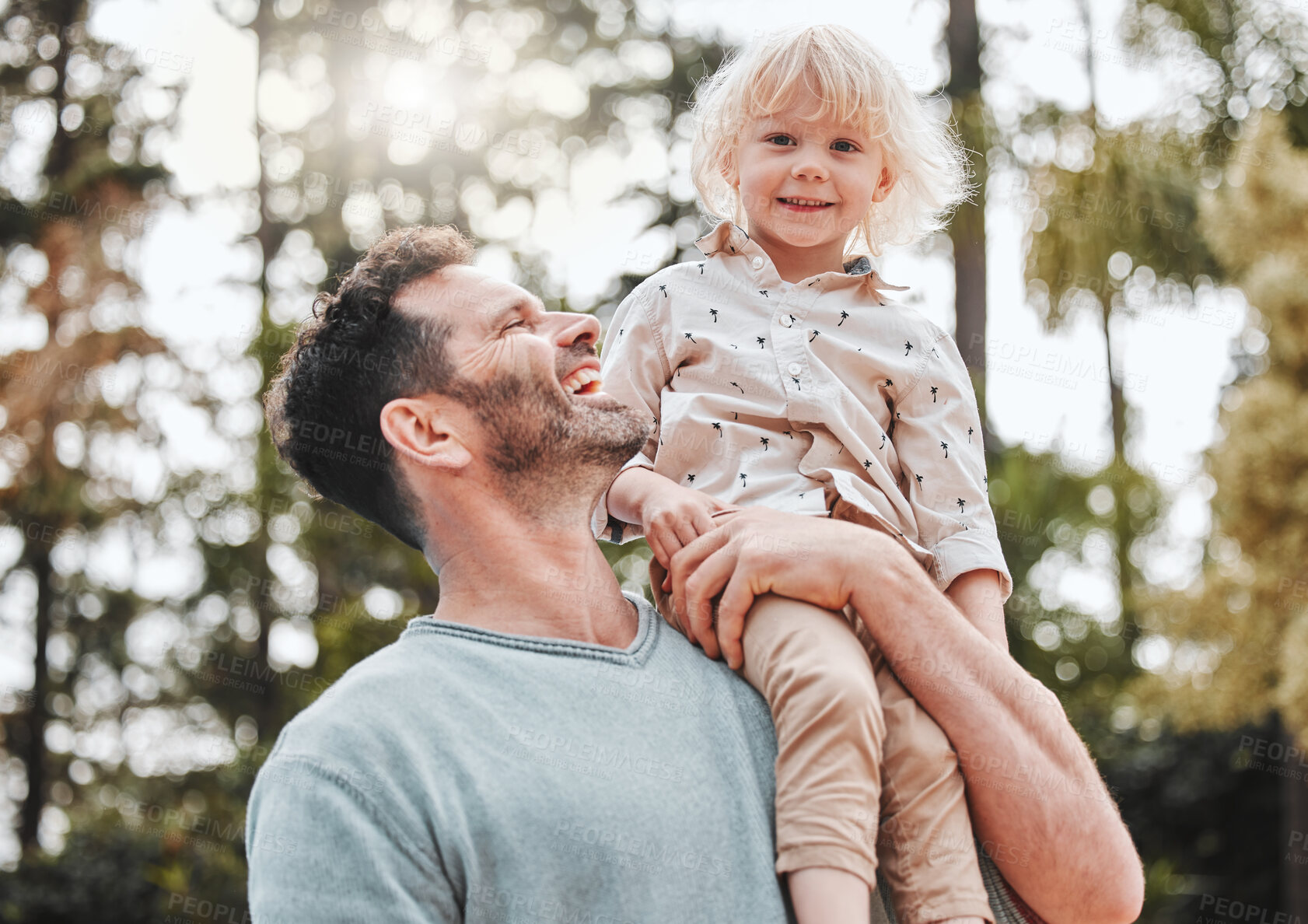 Buy stock photo Shot of a man and his son spending time outdoors