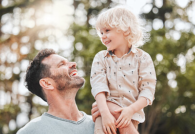 Buy stock photo Shoulder, happy and dad with child in park for bonding, relationship and relaxing together outdoors. Family, morning and father with excited kid in nature for affection, playing and love on weekend