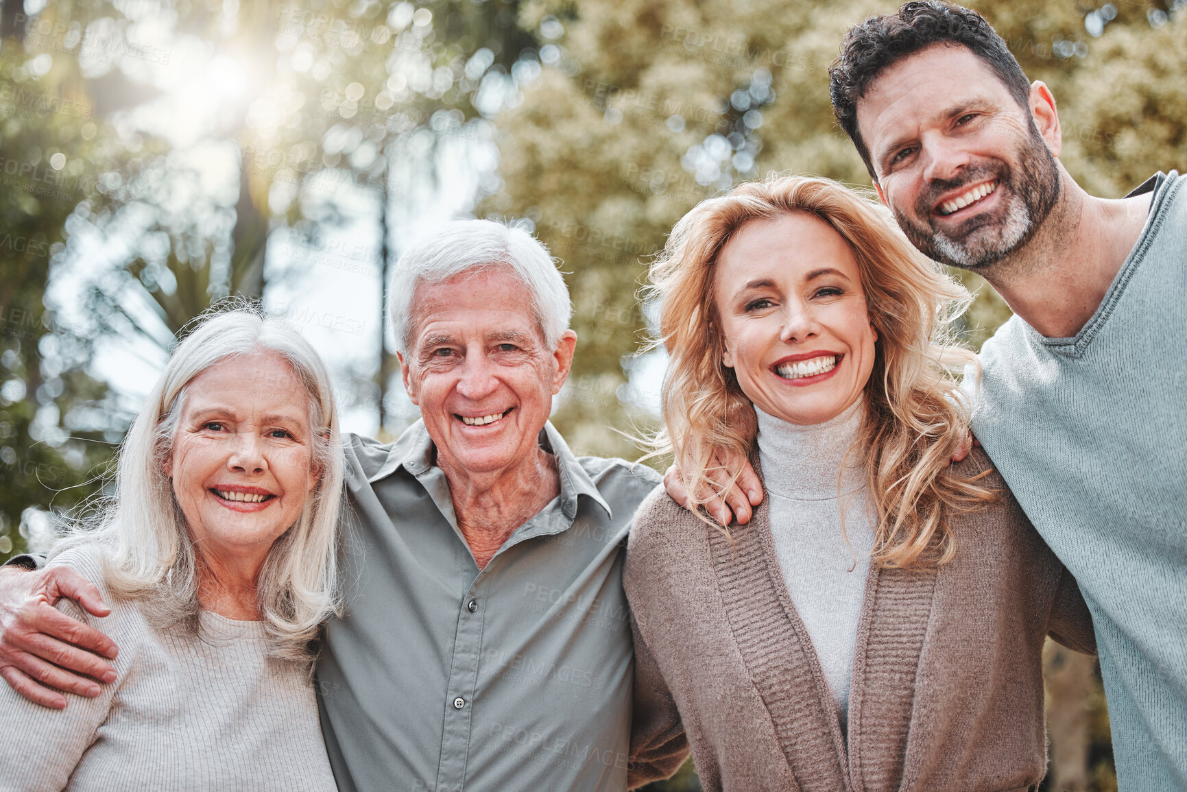 Buy stock photo Hug, senior parents and portrait of couple in park for bonding, relationship and relax together. Love, happy and man and woman embrace elderly mom and dad outdoors for weekend, affection and care