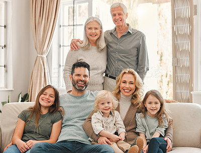 Buy stock photo Shot of a family relaxing together at home