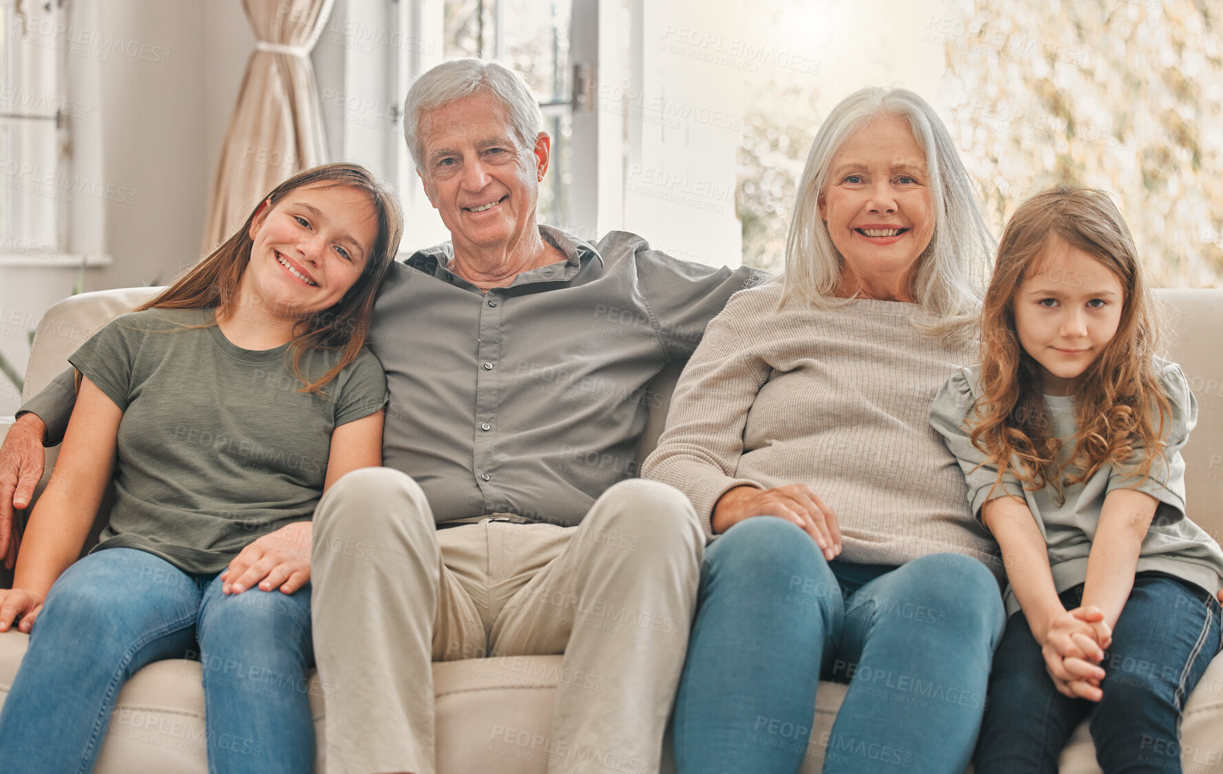 Buy stock photo Portrait, happy family and children with grandparents in home for care, relax and bonding together. Generations, grandma and grandfather with kids in lounge for support, love and smile with sisters