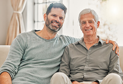 Buy stock photo Shot of a father and son spending time together at home