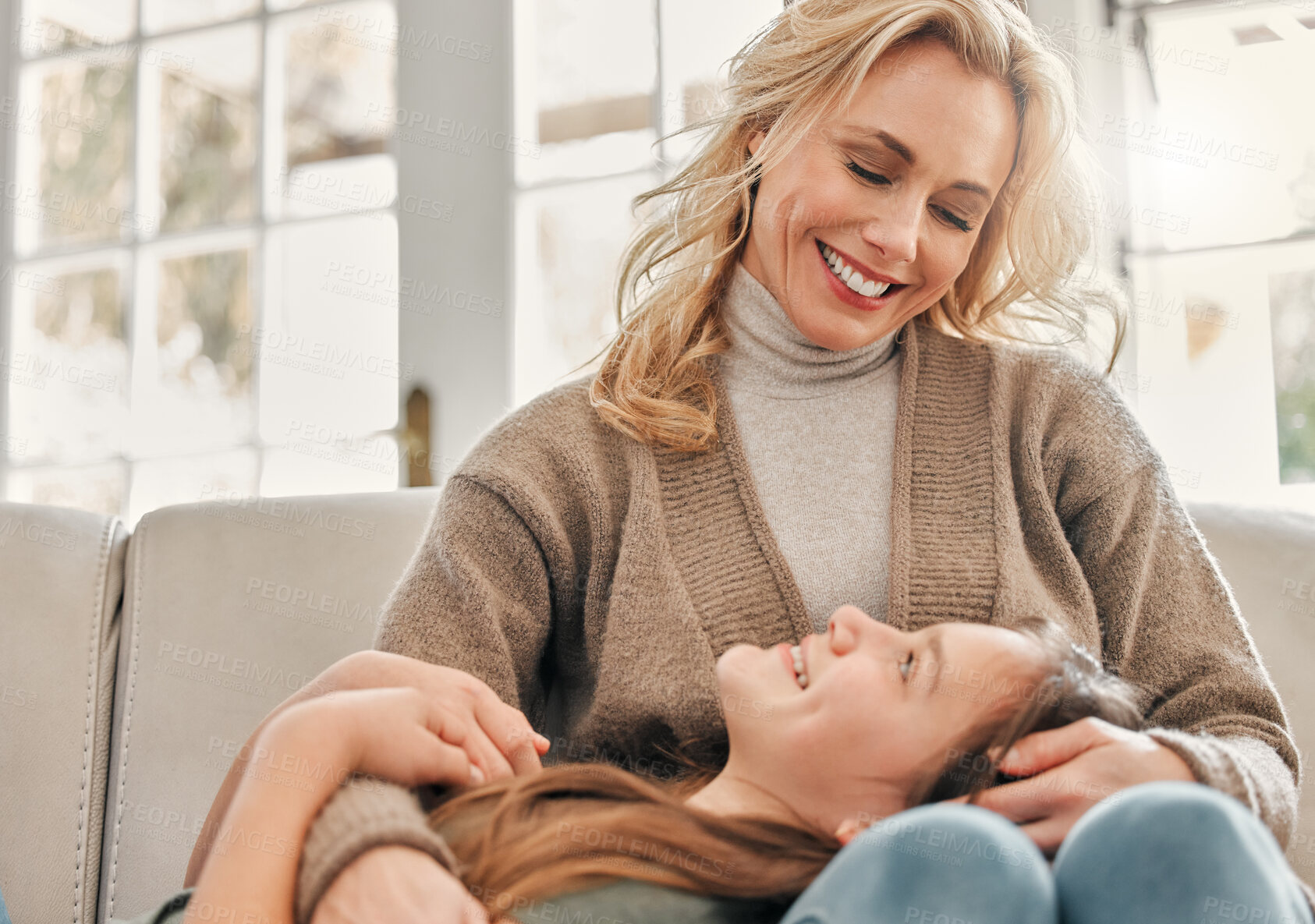 Buy stock photo Woman, child and relax on sofa with love for bonding, support and relationship connection in living room. Happy, mother and girl with hug for physical comfort, trust and security together at house