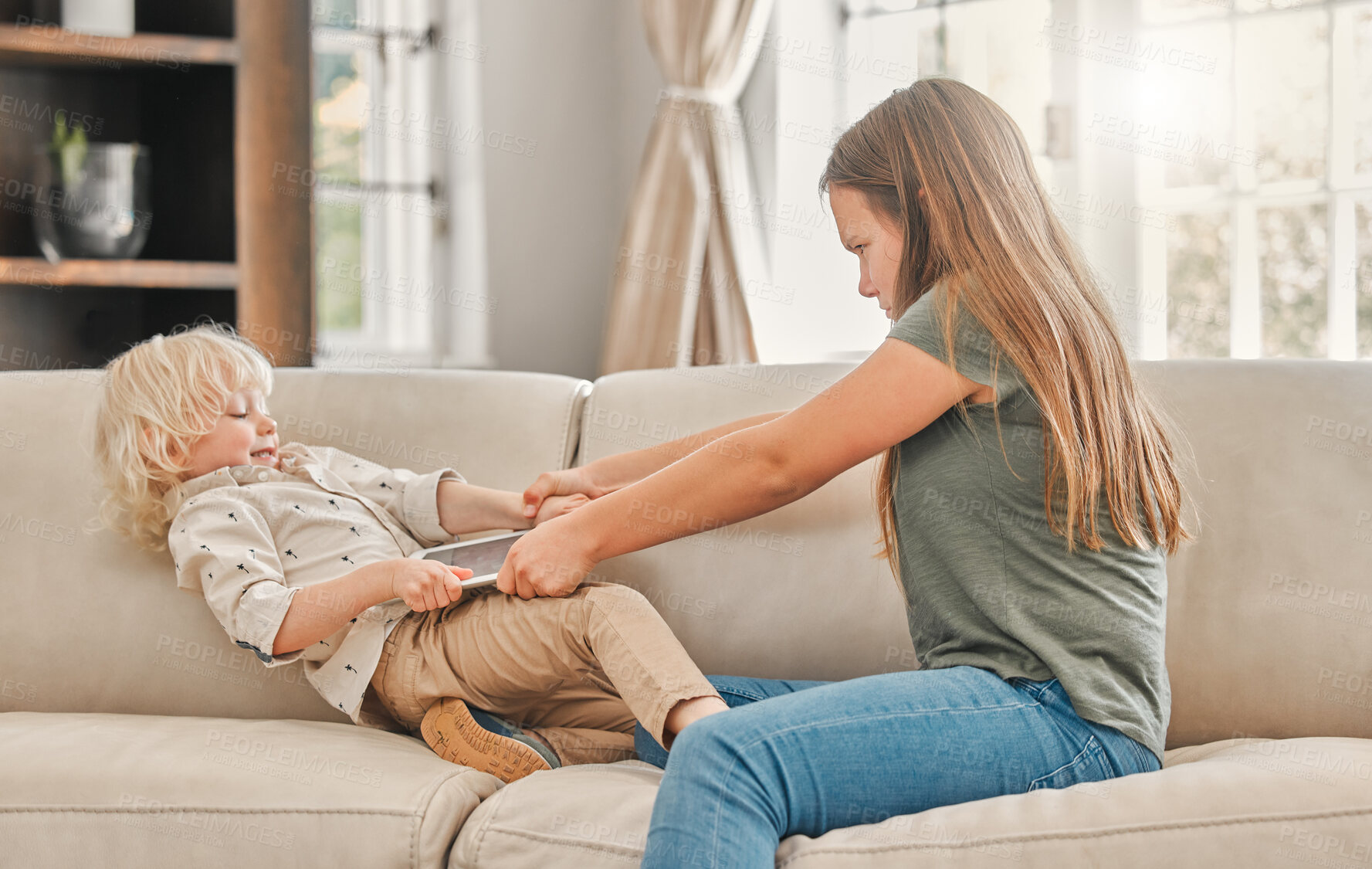 Buy stock photo Family, tablet and kids on sofa for fight, turn and selfish behavior in living room. Girl, boy or sibling argue over tech for bullying, conflict and mean at home for digital app, media or online game