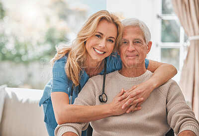 Buy stock photo Shot of a young nursing home nurse hugging her male elderly patient