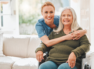 Buy stock photo Shot of a female nurse hugging her mature patient