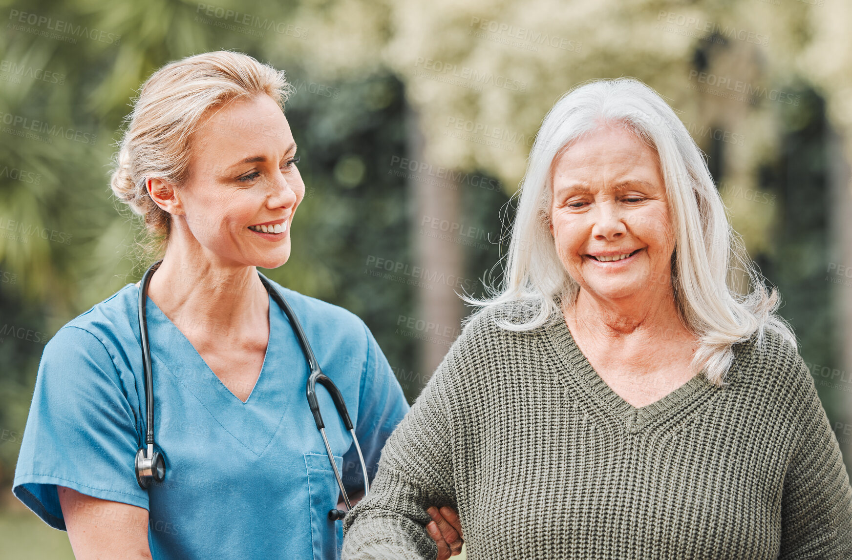 Buy stock photo Support, smile and nurse walking elderly woman in a garden to relax, wellness and morning exercise in the lawn. Trust, nursing home and caregiver help senior person smile and happy for outdoor walk