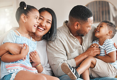 Buy stock photo Mother, dad and play with children on sofa for bonding with comfort, love and connection for embrace or affection. Mom, father and kids or siblings with fun laughter, family home and happy together.