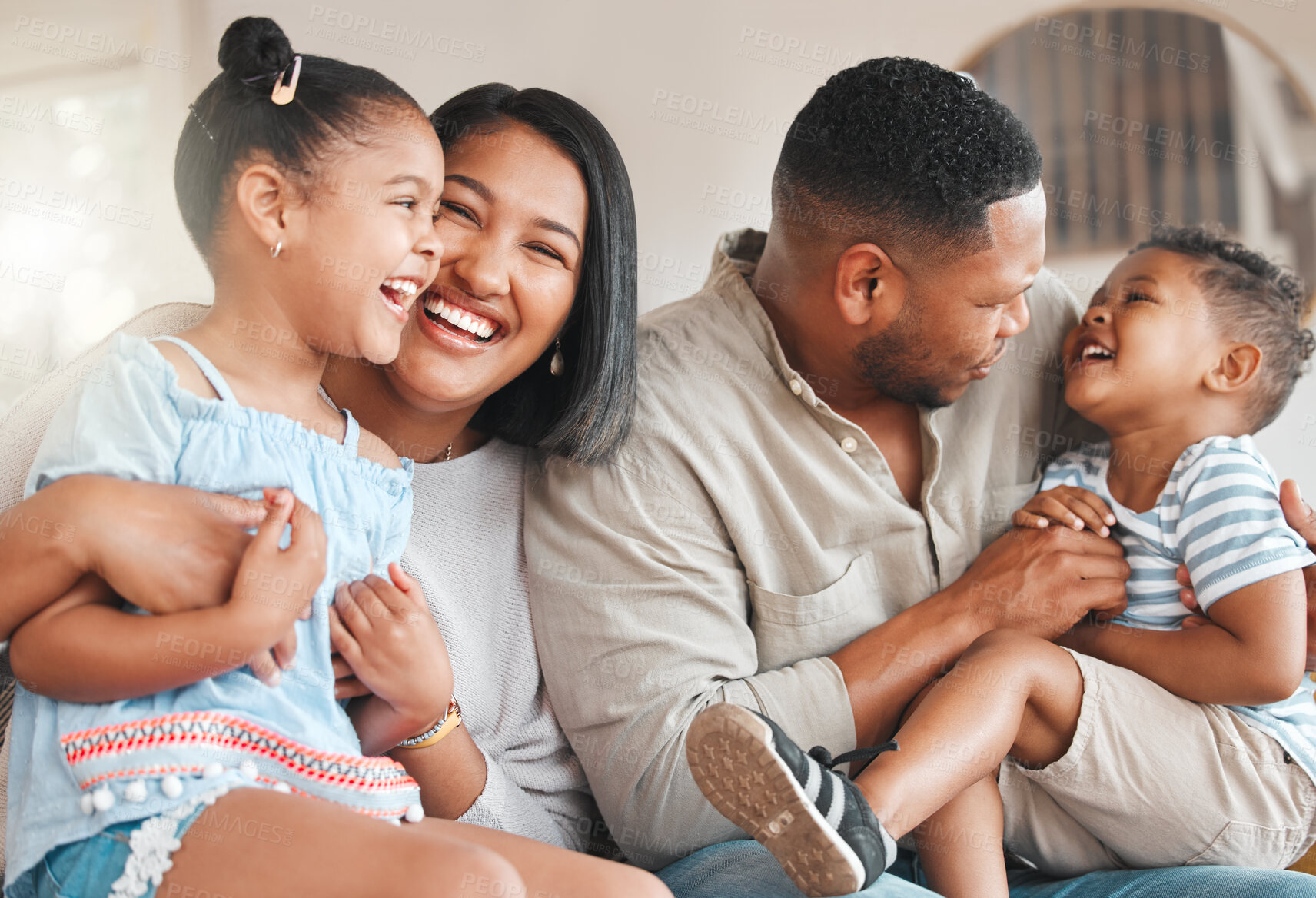 Buy stock photo Mother, dad and play with children on sofa for bonding with comfort, love and connection for embrace or affection. Mom, father and kids or siblings with fun laughter, family home and happy together.