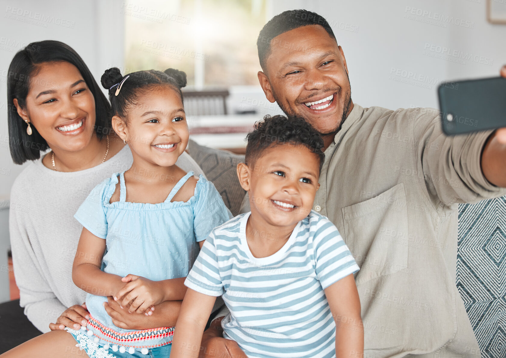 Buy stock photo Happy, family and selfie in home together, children and parents on sofa with love for relationship or bonding. Smile, weekend break and photography or capture profile picture, memory and living room