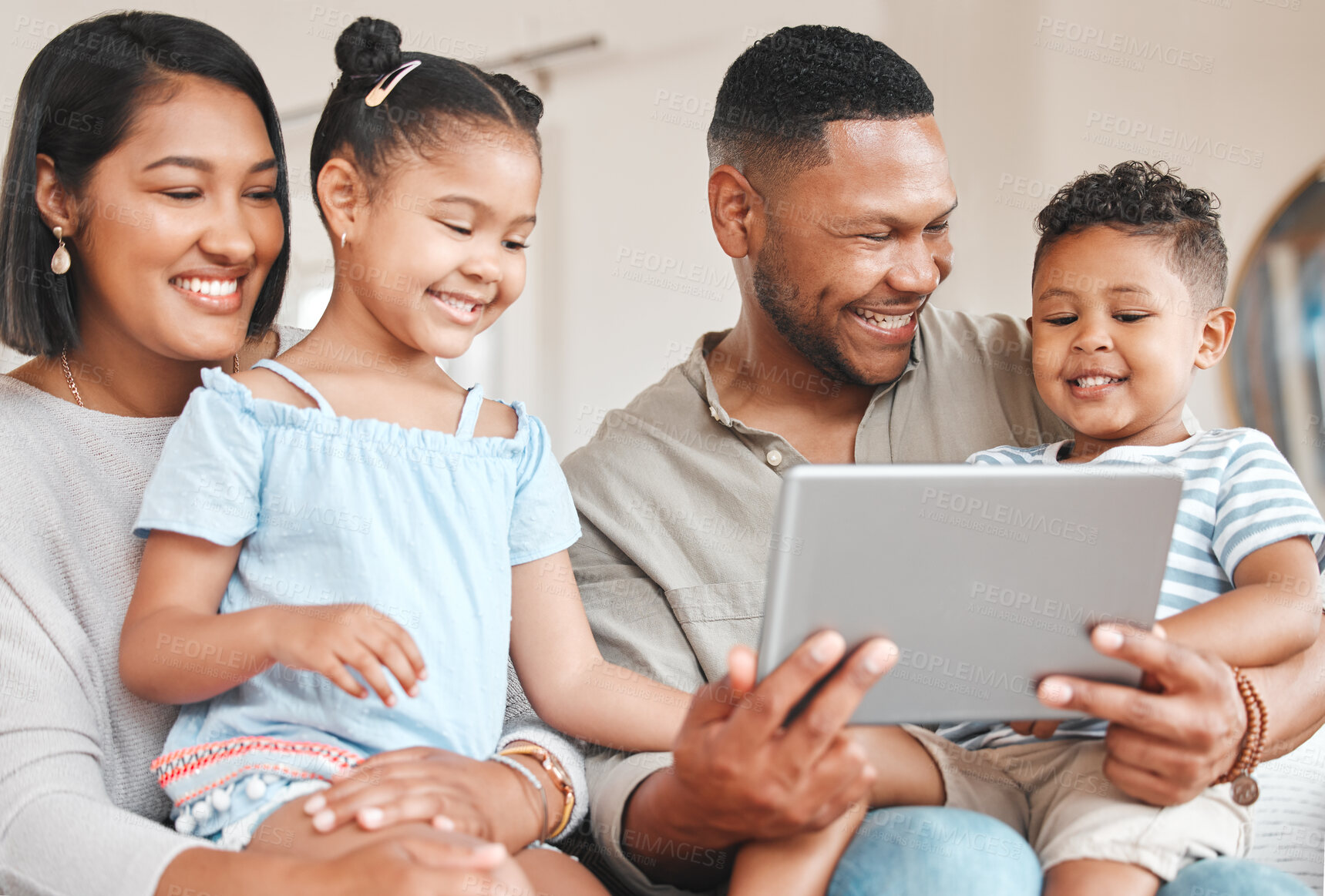 Buy stock photo Mom, children and dad with tablet on couch for online activities, kids educational apps and digital storytelling. Mother, father and family home with internet for boy or girl, screen time and bonding