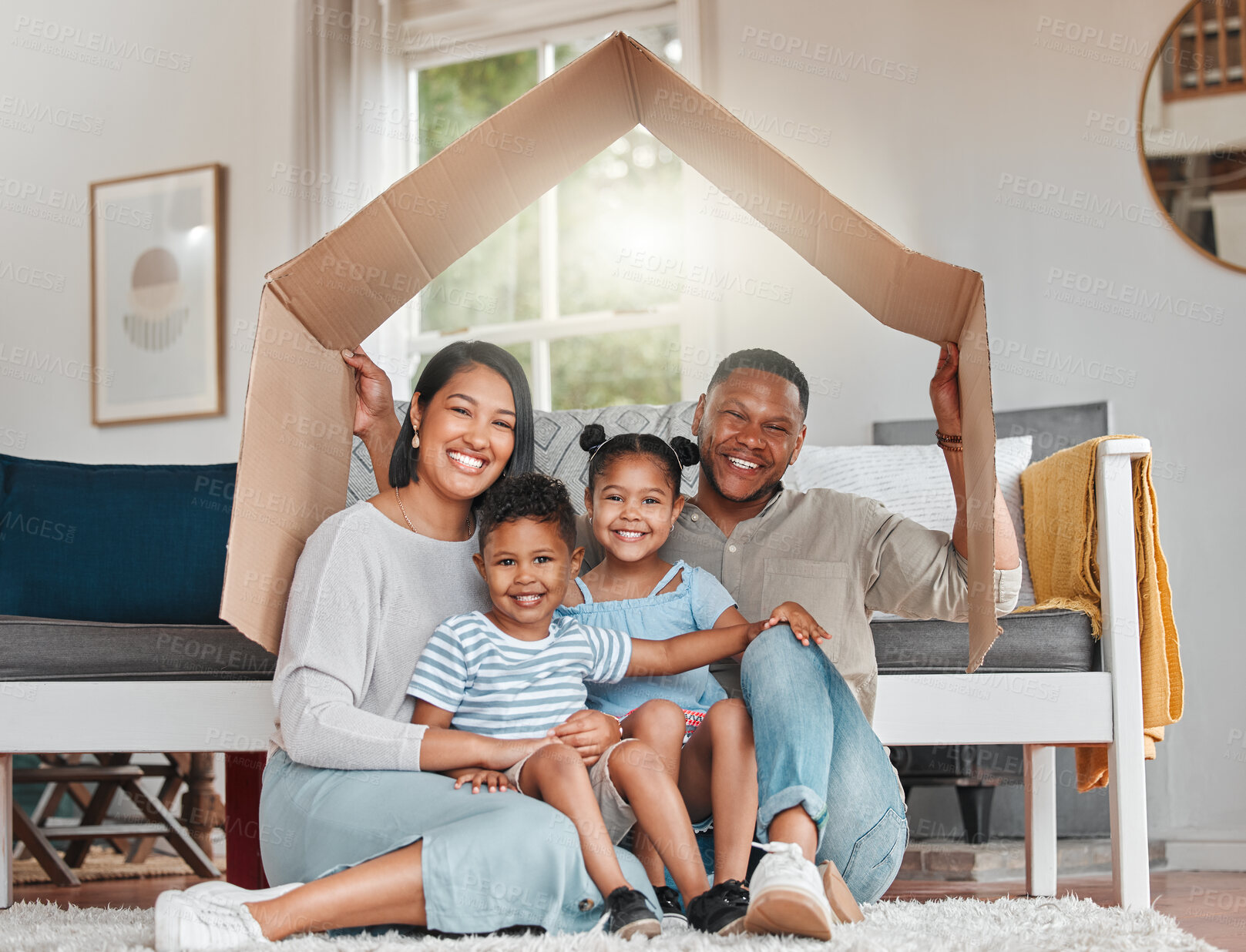 Buy stock photo Cardboard, insurance and portrait of family on floor in living room of home for cover or mortgage. Roof, safety or security with mother, father and children in apartment for finance or investment