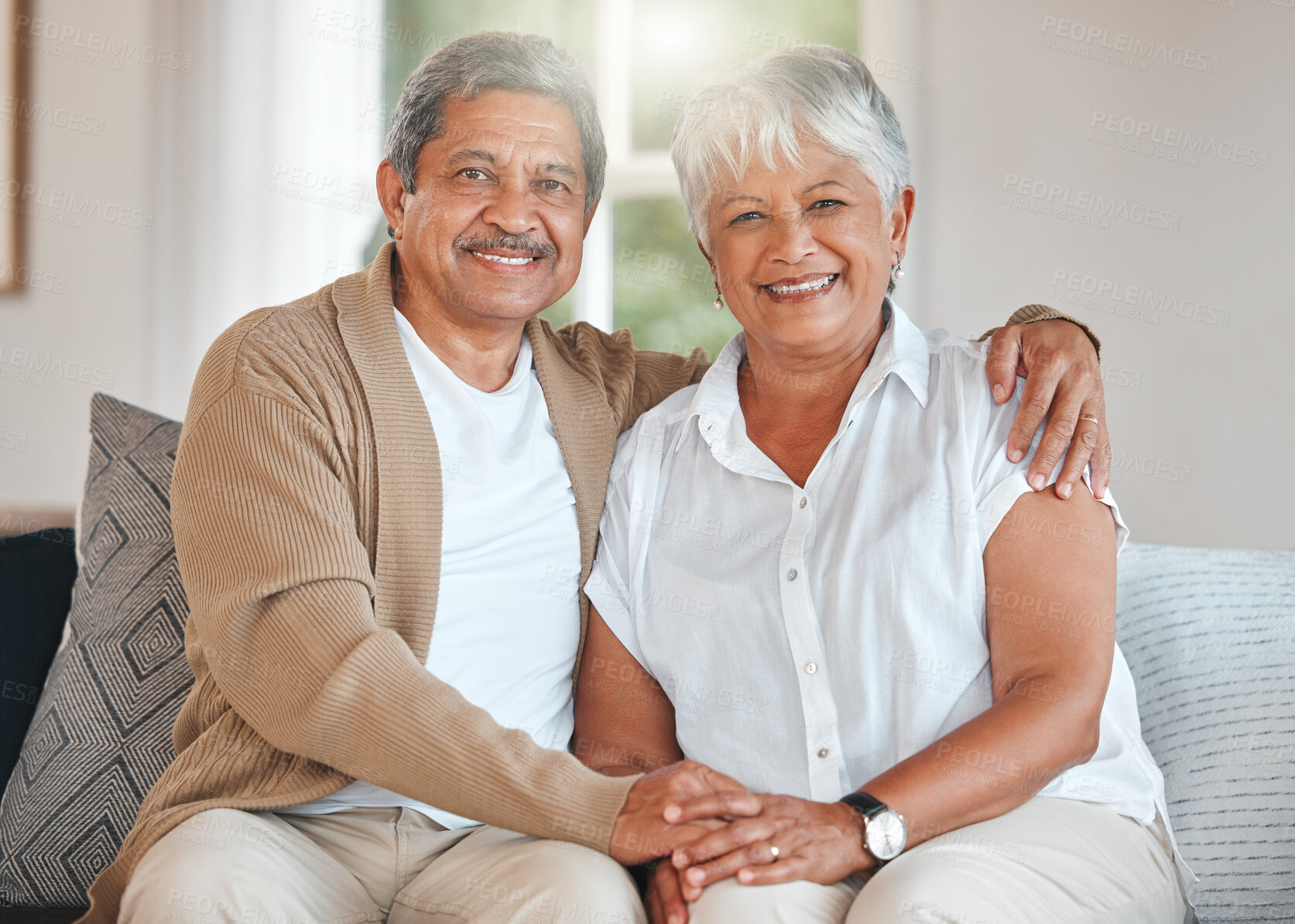 Buy stock photo Senior, happy couple and portrait on sofa with love, relationship bonding and affection with trust or support. Elderly man, woman and together on couch in home with care, marriage loyalty and embrace