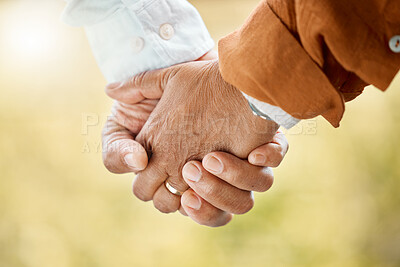 Buy stock photo Holding hands, love and senior couple closeup outdoor in garden together for bonding or retirement. Peace, support or trust with elderly man and woman in garden or park for dating or romance