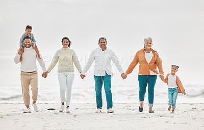 Buy stock photo Full length shot of an affectionate family of six on the beach