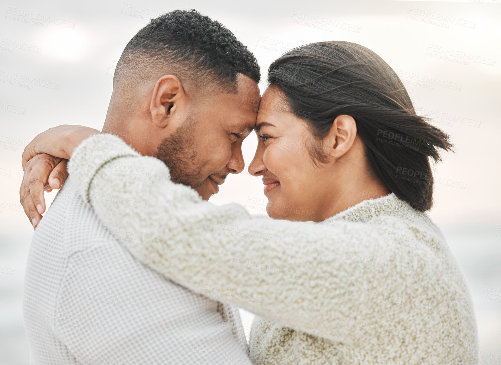 Buy stock photo Beach, hug and couple touching forehead with love for affection, relationship or weekend getaway. Travel, married man and happy woman with embrace for vacation, anniversary or romantic date in Mexico