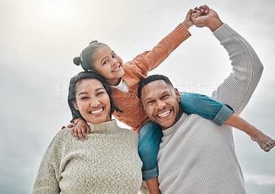 Buy stock photo Family, holding hands and piggyback portrait at beach, mother and father for ocean holiday. People, bonding and love for sea waves in outdoor vacation, happiness and carrying game together in nature