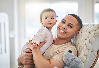 Buy stock photo Father, holding baby and portrait in a family home for bonding, security and quality time. Man or dad and girl child relax together on a sofa for development, trust and support or care with a smile